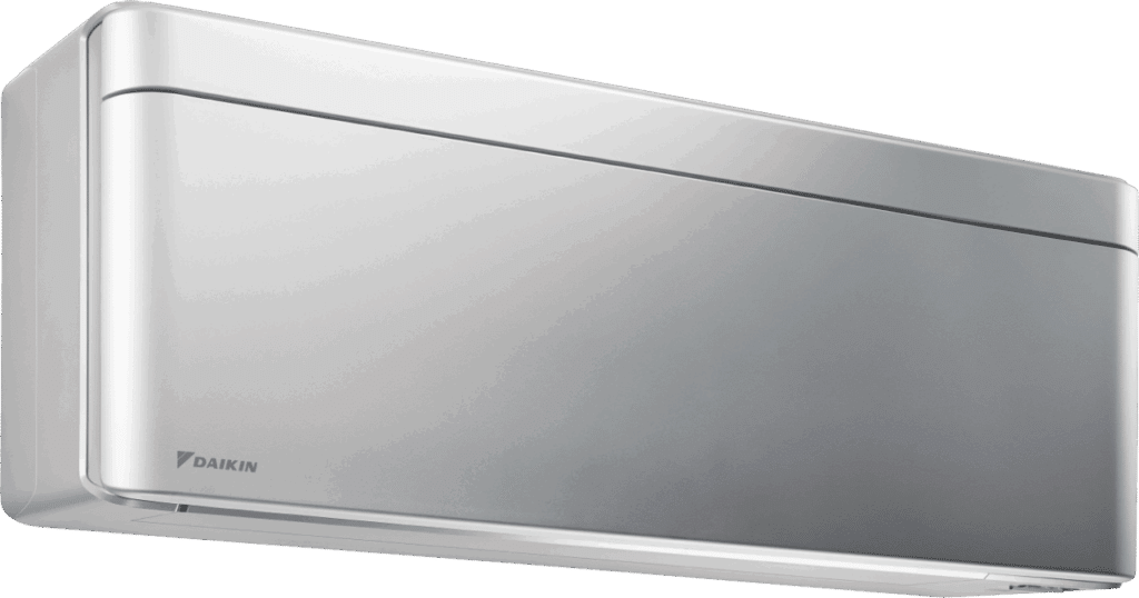 Unité intérieure Daikin gris clair au design moderne, vue de côté, avec le logo Daikin visible en bas à gauche.